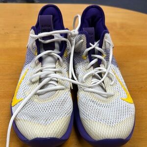 Nike Purple and Yellow Athletic Shoes with Streamlined Design